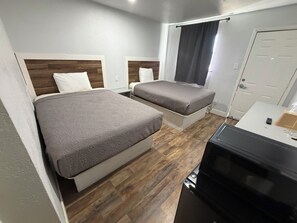 Standard Single Room, 2 Queen Beds, Non Smoking | Free WiFi