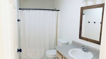 Hair dryer, towels, soap, toilet paper