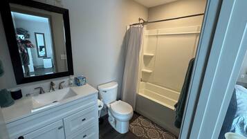 Hair dryer, towels, soap, toilet paper