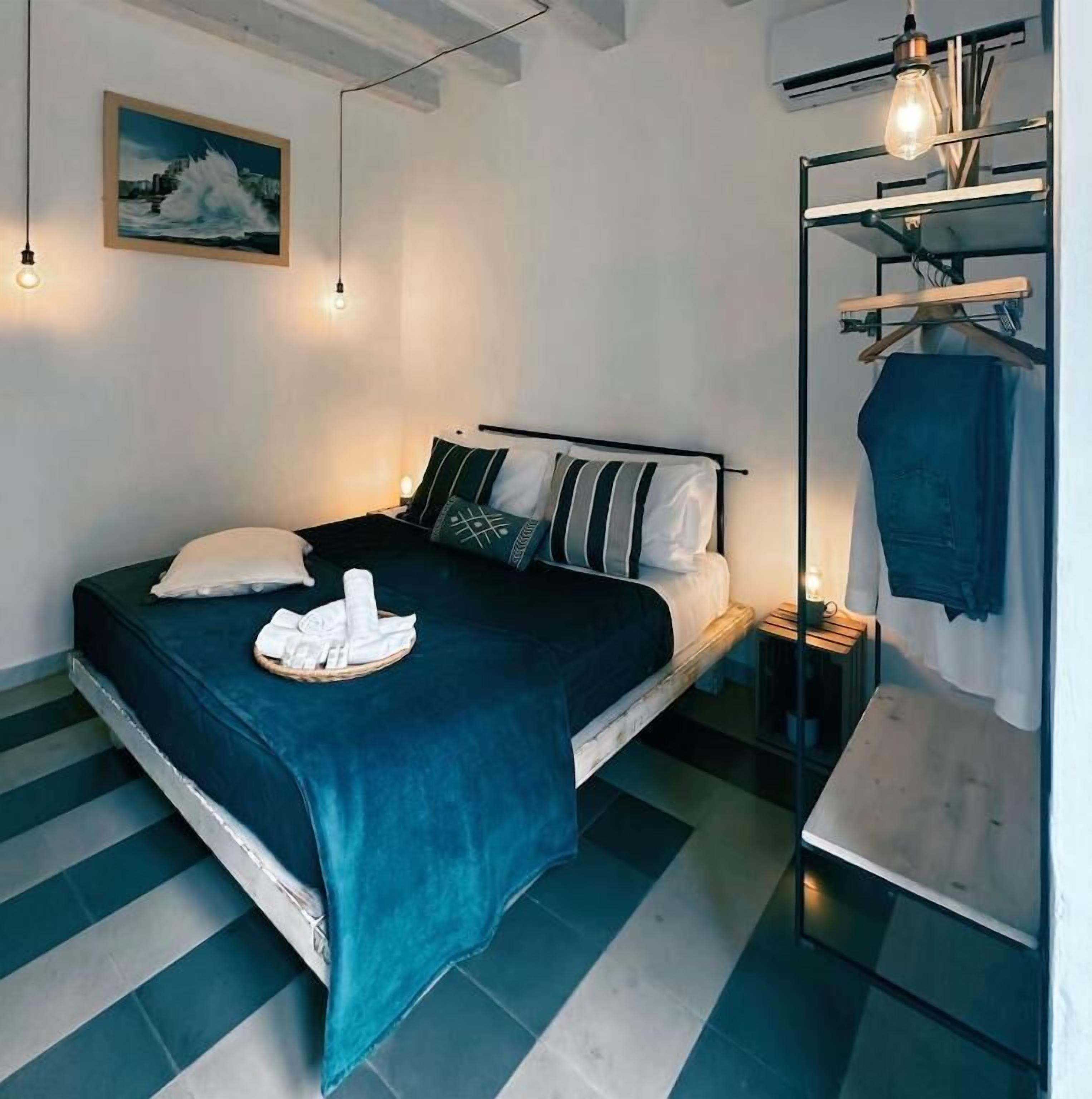 Deluxe Double Room, Balcony, Partial Sea View | Blackout drapes, iron/ironing board, free WiFi, bed sheets