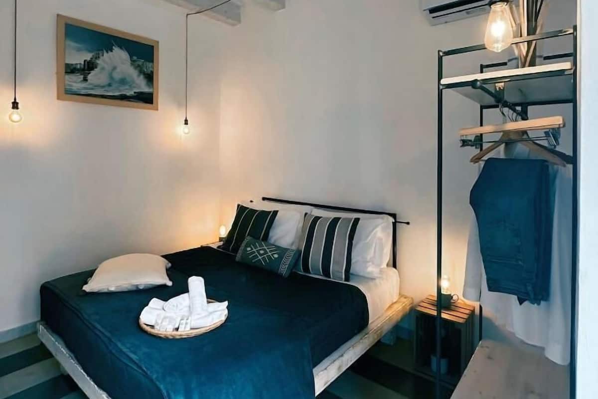 Deluxe Double Room, Balcony, Partial Sea View | Blackout drapes, iron/ironing board, free WiFi, bed sheets