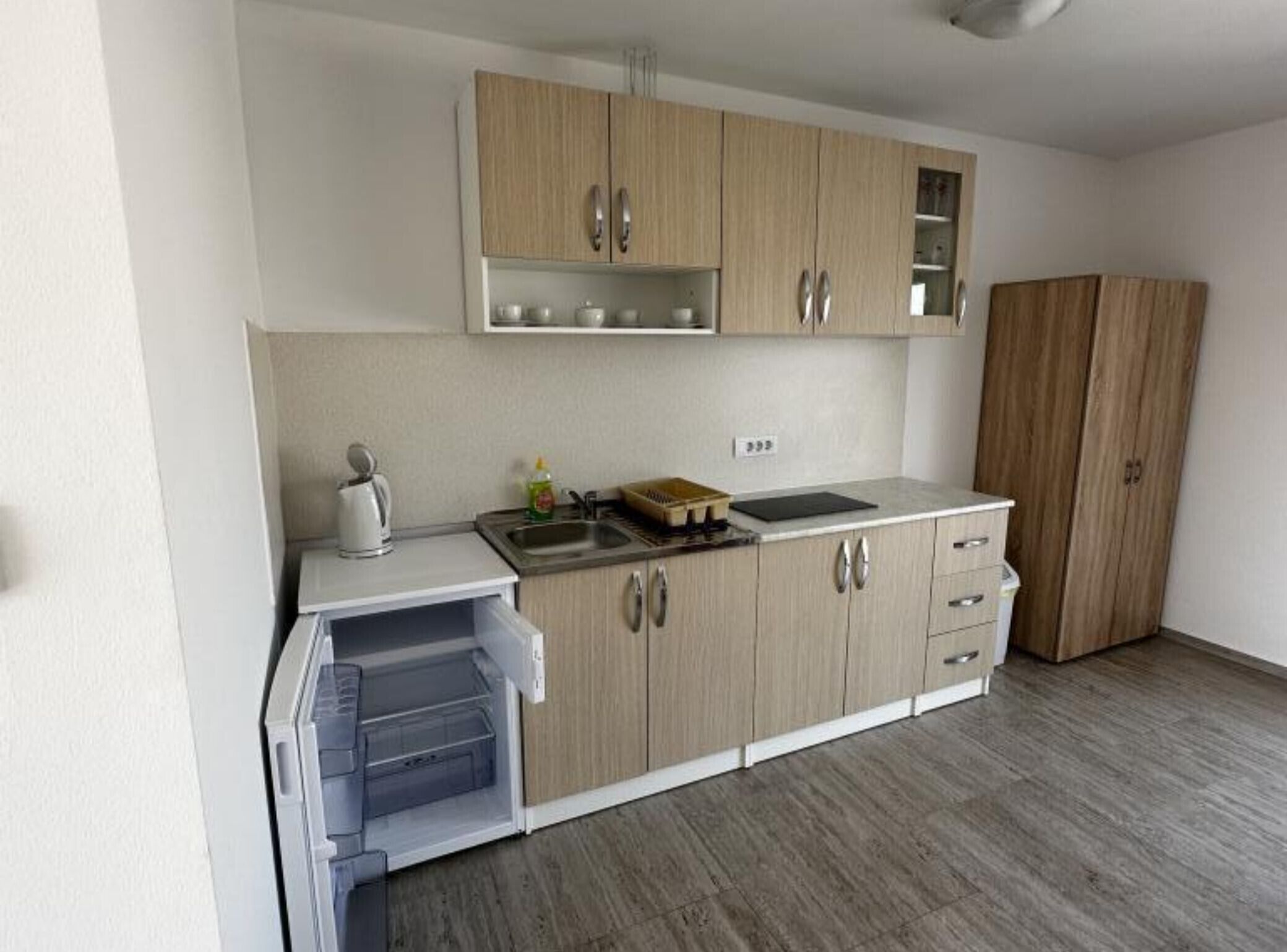 Fridge, coffee/tea maker, cookware/dishes/utensils