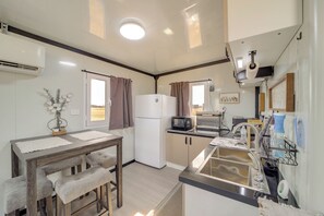 Fridge, microwave, coffee/tea maker, toaster