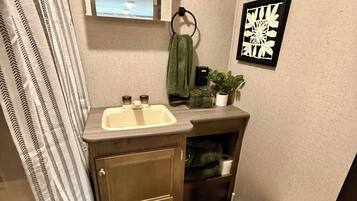 Hair dryer, towels, soap, toilet paper