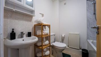 Hair dryer, towels, soap, toilet paper