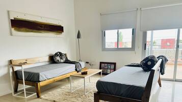 Desk, travel crib, free WiFi, bed sheets