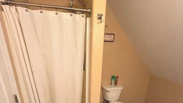 Shower, towels, soap, toilet paper