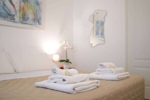 Iron/ironing board, travel crib, WiFi (free), bed sheets
