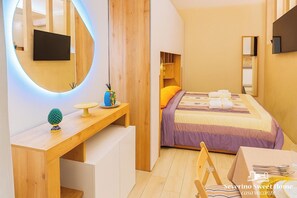 1 chambre, coffres-forts dans les chambres, fer et planche à repasser