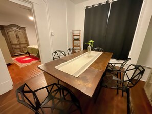 Deluxe Apartment, 2 Bedrooms, Kitchen, Courtyard Area | In-room dining