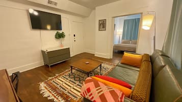 Deluxe Apartment, 2 Bedrooms, Kitchen, Courtyard View | Living area | 40-inch Smart TV with digital channels, Netflix, Hulu