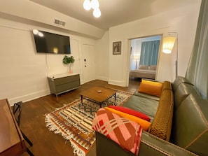 Deluxe Apartment, 2 Bedrooms, Kitchen, Courtyard View | Living area | 40-inch Smart TV with digital channels, Netflix, Hulu