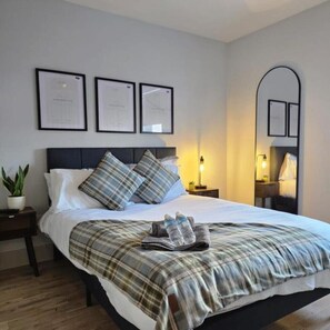 2 dormitorios, tabla de planchar con plancha, wifi gratis y ropa de cama