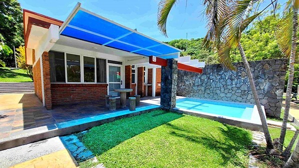 Camera familiare, vista giardino | Terrazza/patio