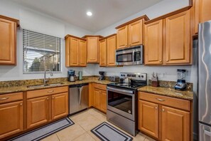 House, 6 Bedrooms, Private Pool | Private kitchen | Full-size fridge, microwave, oven, stovetop - Six BR Home at ChampionsGate Resort (Four Corners)