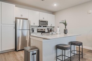 Fridge, dining tables - Landing | Modern 1BD, Pool (Tice)