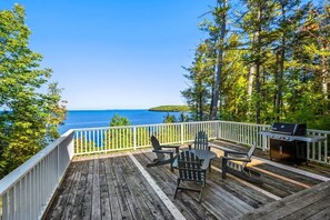 Located in Gills Rock, this property offers tranquility and sweeping water views at Door County’s northern edge. Guests can enjoy nearby hiking, fishing, and local dining while returning to a private and peaceful retreat. - Garrett Bay View Cottage · 3 Acres · Fireplace (Ellison Bay)