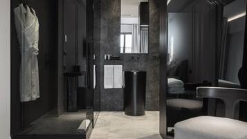 Shower, hair dryer, slippers, towels