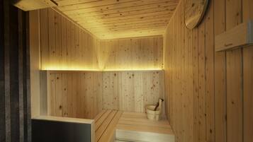 Ein Saunaraum aus Holz mit einer Bank, einem Eimer und einem an der Wand befestigten Thermometer.