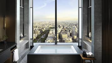 Suite, 1 King Bed (Conrad) | Bathroom | Separate bathtub and shower, free toiletries, hair dryer, bathrobes