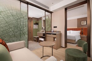 Habitación, 1 cama King size y sofá cama (Guest) | Área de sala de estar