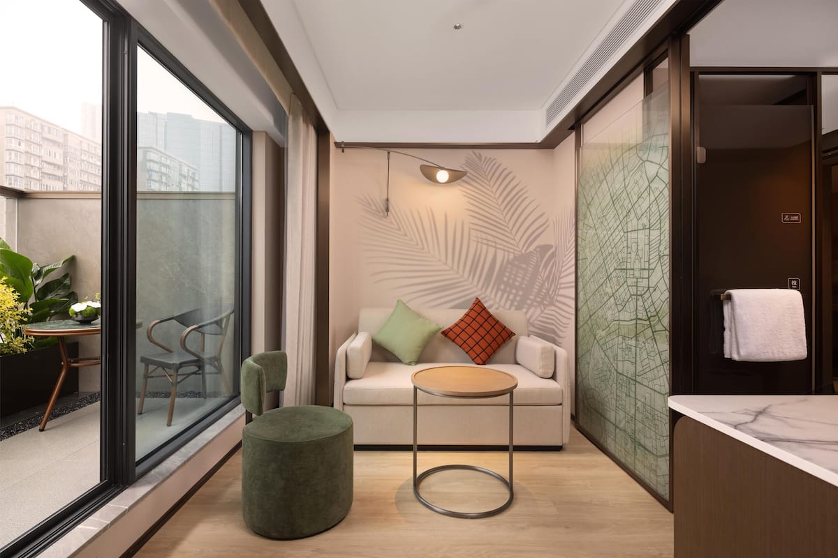 Quarto, 1 cama King e sofá-cama (Guest) | Área de estar