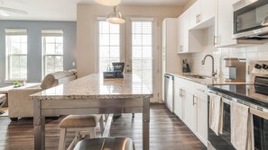 Fridge, dining tables - Landing | Modern 1BD, Gym, Game Room (Orlando)