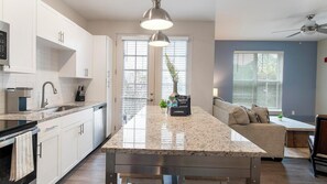 Fridge, dining tables - Landing | Modern 1BD, Gym, Game Room (Orlando)