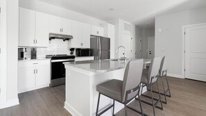 Fridge, dining tables - Landing | Stylish 2BD, Pool (Tice)