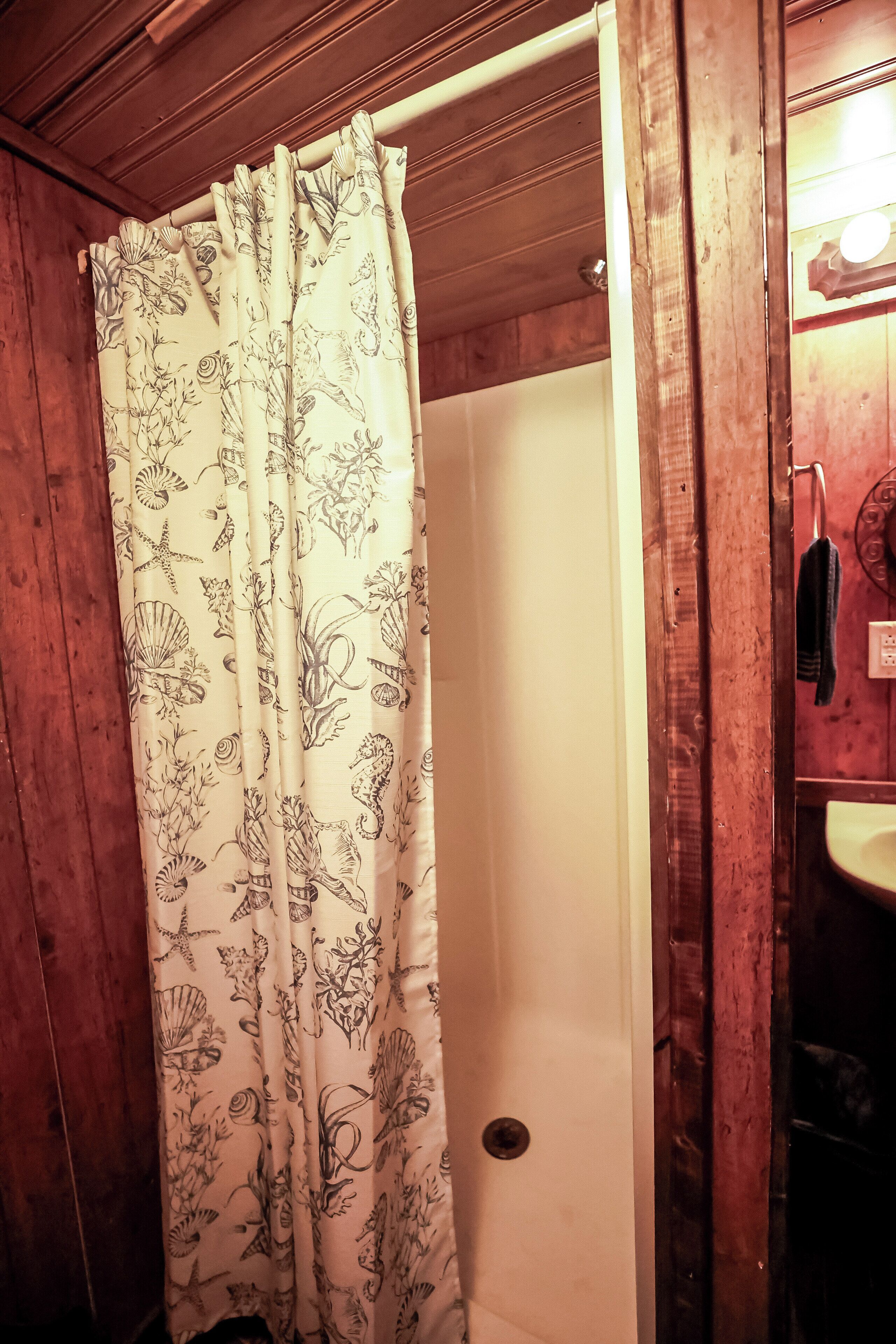 Shower, towels, soap, toilet paper