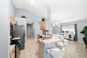 Fridge, microwave, oven, stovetop - Vibrant 4BR Disney Area Home w/ Pool & Games (Kissimmee)