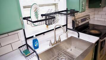 Een magnetron, een oven, een kookplaat