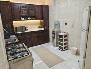 Fridge, microwave, oven, stovetop - Luxury Panoramic Nile View | 3BR | Prime Location (Giza Governorate)