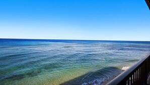 A clear view of the ocean from a balcony with a railing. - New Listing! Stunning Oceanfront Oasis (Honokowai)
