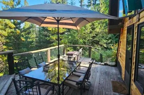 Pet friendly off grid chalet tucked away on a mountainside .