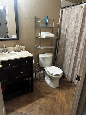 Hair dryer, towels, soap, toilet paper