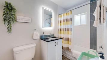 Hair dryer, towels, soap, shampoo