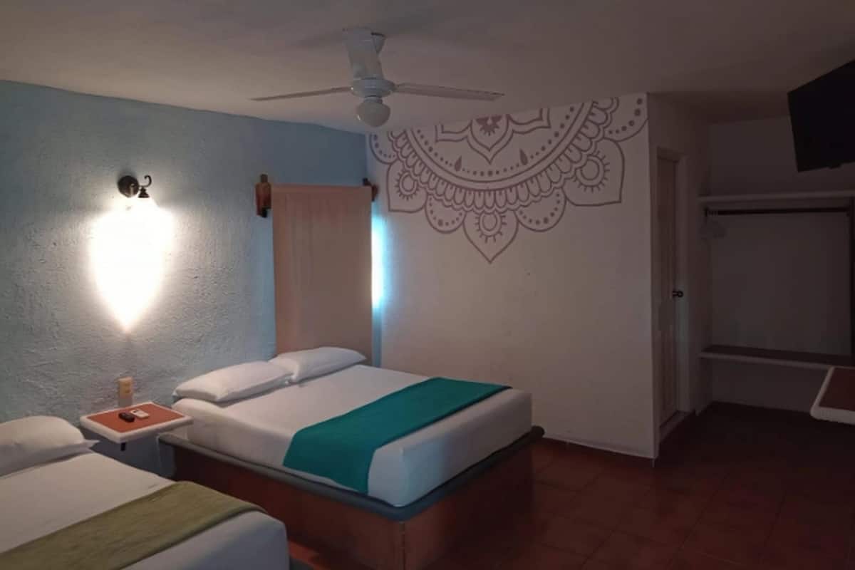 舒适四人房, 花园景观 | 笔记本电脑工作区、免费 WiFi