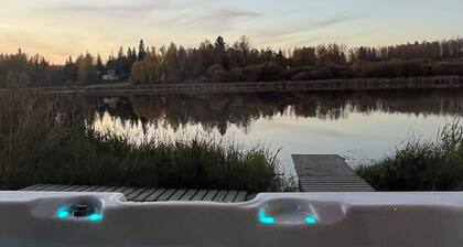 Lake Front Getaway- Incredible water views and Waterfront Hottub!