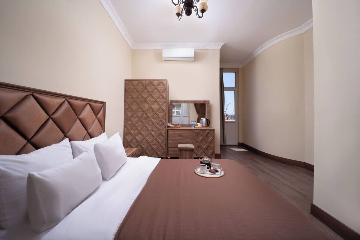 Deluxe kamer, balkon, uitzicht op stad | Gratis wifi