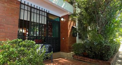 A colorful, peaceful oasis in Girardot, a bright family home designed for rest.