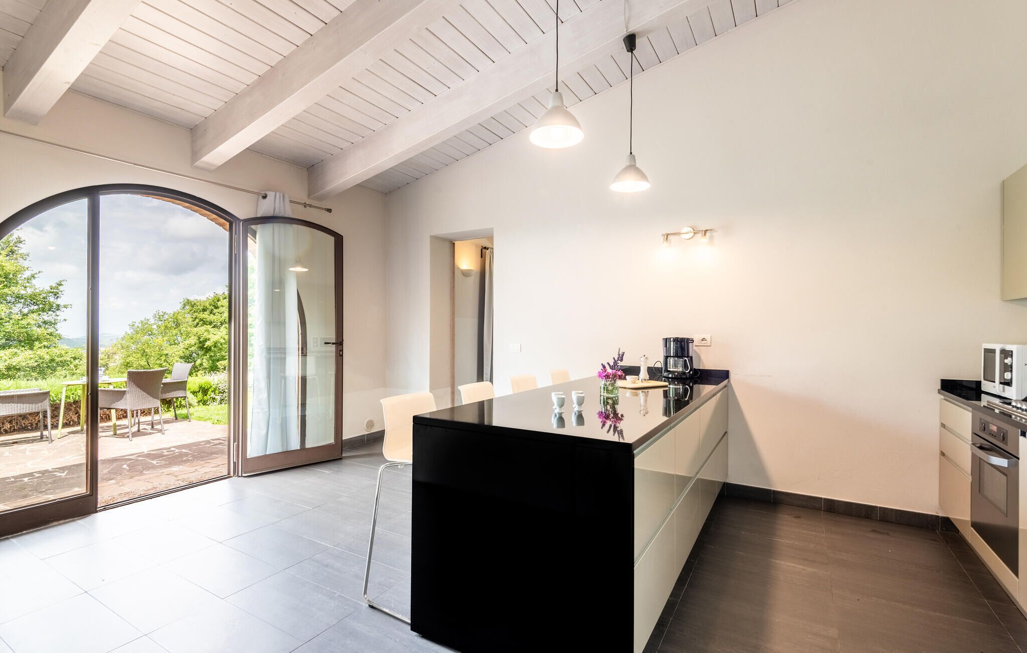 Fridge, stovetop, dishwasher, coffee/tea maker