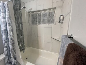 Hair dryer, towels, soap, shampoo