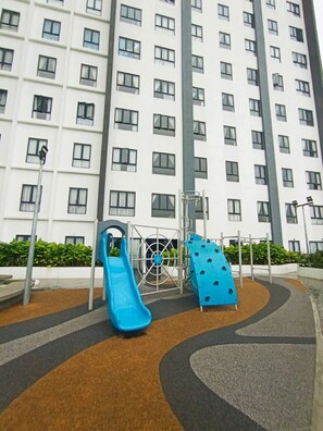 Appartement Confort, vue ville | Espace pour enfants