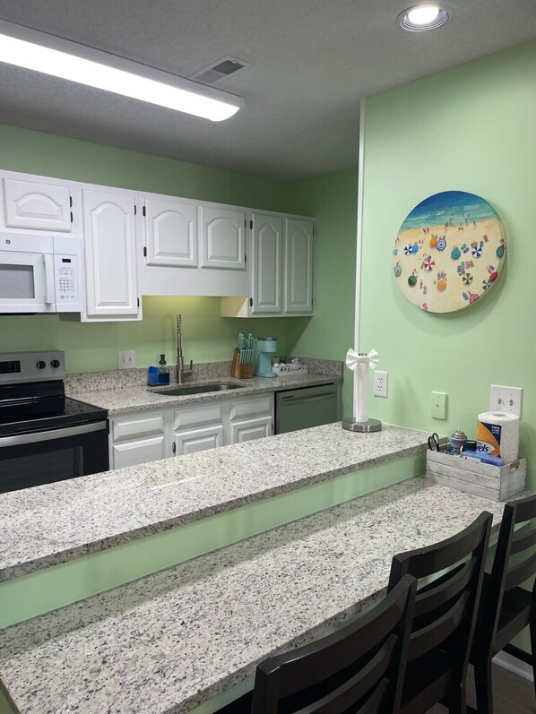 Front of property - Pelicans Reef Large 2BR Condo w/ Vaulted Ceilings, Loft Bedroom & Space for 8 Guests (Surfside Beach)