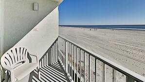 A balcony with a view of a beach. - Sands Beach Club 123 (Myrtle Beach)