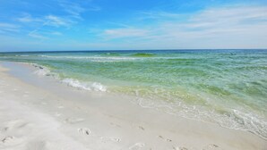 A beach with clear turquoise water and white sand. - Sea Dunes 502 - Beach Oasis (Fort Walton Beach)