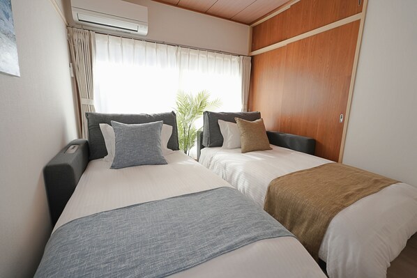 1 habitación, tabla de planchar con plancha, wifi gratis y ropa de cama 