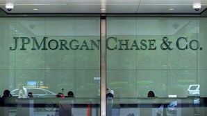 The entrance to JPMorgan Chase & Co. with a glass facade and a central door. - Luxurious 2b2b Near Toyota HQ, The Star, Legacy West (Frisco)