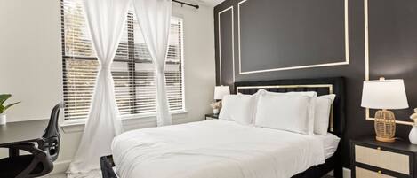 1 bedroom, laptop workspace, iron/ironing board, bed sheets